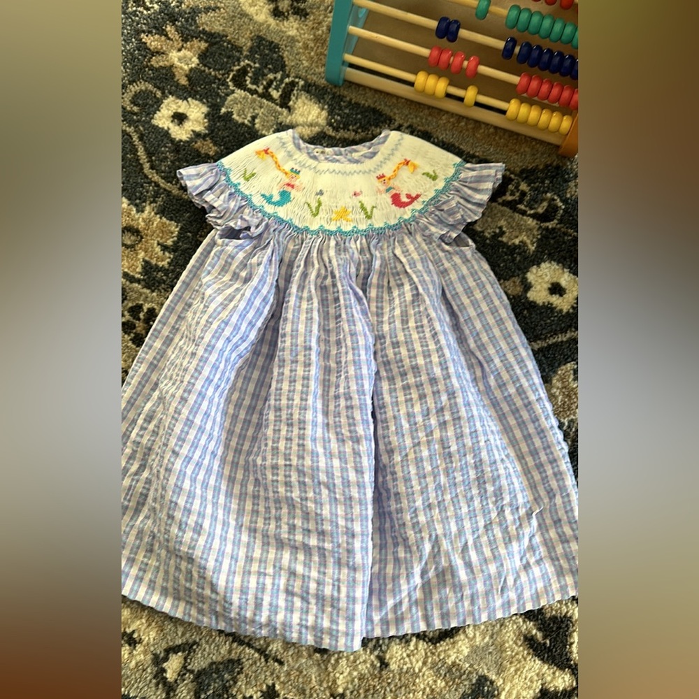 Classy Couture size 9mths smocked “Mermaid” dress. So cute!